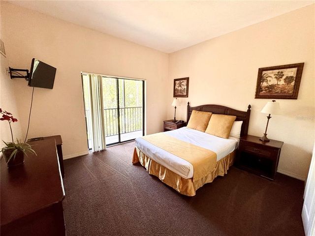 9051 TREASURE TROVE LANE 206, Kissimmee, FL 34747