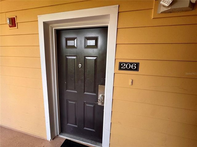 9051 TREASURE TROVE LANE 206, Kissimmee, FL 34747