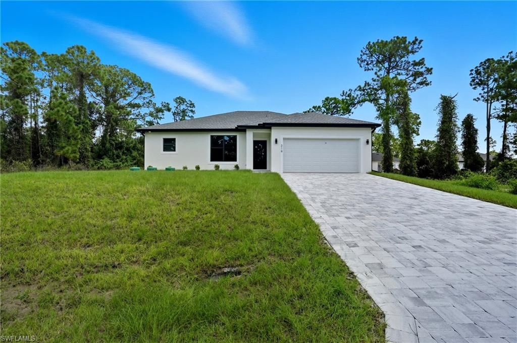 219 Ogden AVE S, LEHIGH ACRES, FL 33974 — exterior