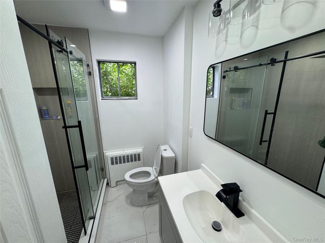 303 Woodbury Road, Hicksville, NY 11801