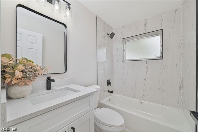26 Maple AVE N, Lehigh Acres, FL 33936