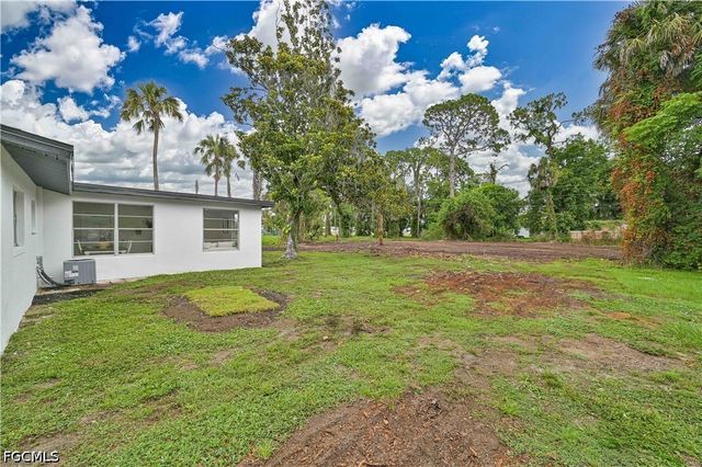 26 Maple AVE N, Lehigh Acres, FL 33936