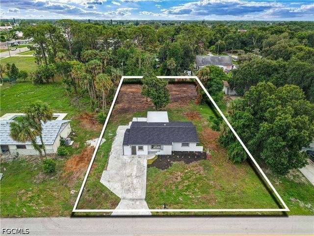 26 Maple AVE N, Lehigh Acres, FL 33936