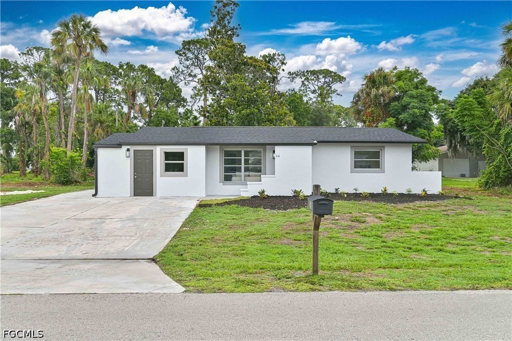 26 Maple AVE N, Lehigh Acres, FL 33936