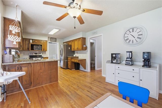 1240 E Sleepy Hollow Drive, Olathe, KS 66062