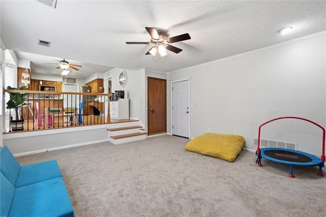 1240 E Sleepy Hollow Drive, Olathe, KS 66062