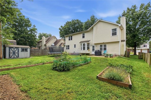1240 E Sleepy Hollow Drive, Olathe, KS 66062