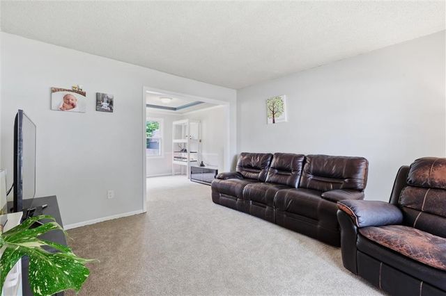 1240 E Sleepy Hollow Drive, Olathe, KS 66062
