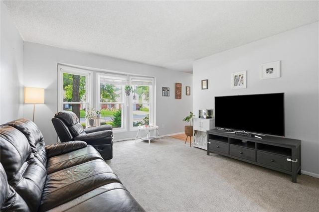 1240 E Sleepy Hollow Drive, Olathe, KS 66062