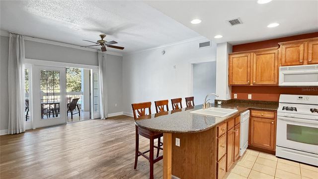 7697 HERITAGE CROSSING WAY 202, Reunion, FL 34747