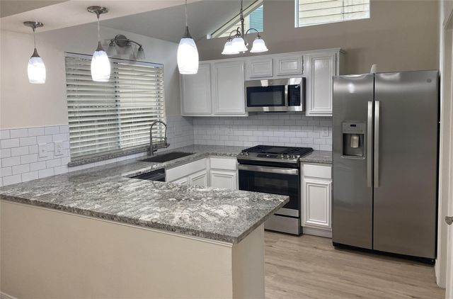 33 N Rain Forest Court, The Woodlands, TX 77380