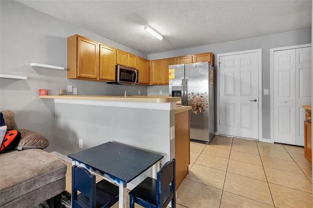 509 CRESTING OAK CIRCLE 73, Orlando, FL 32824