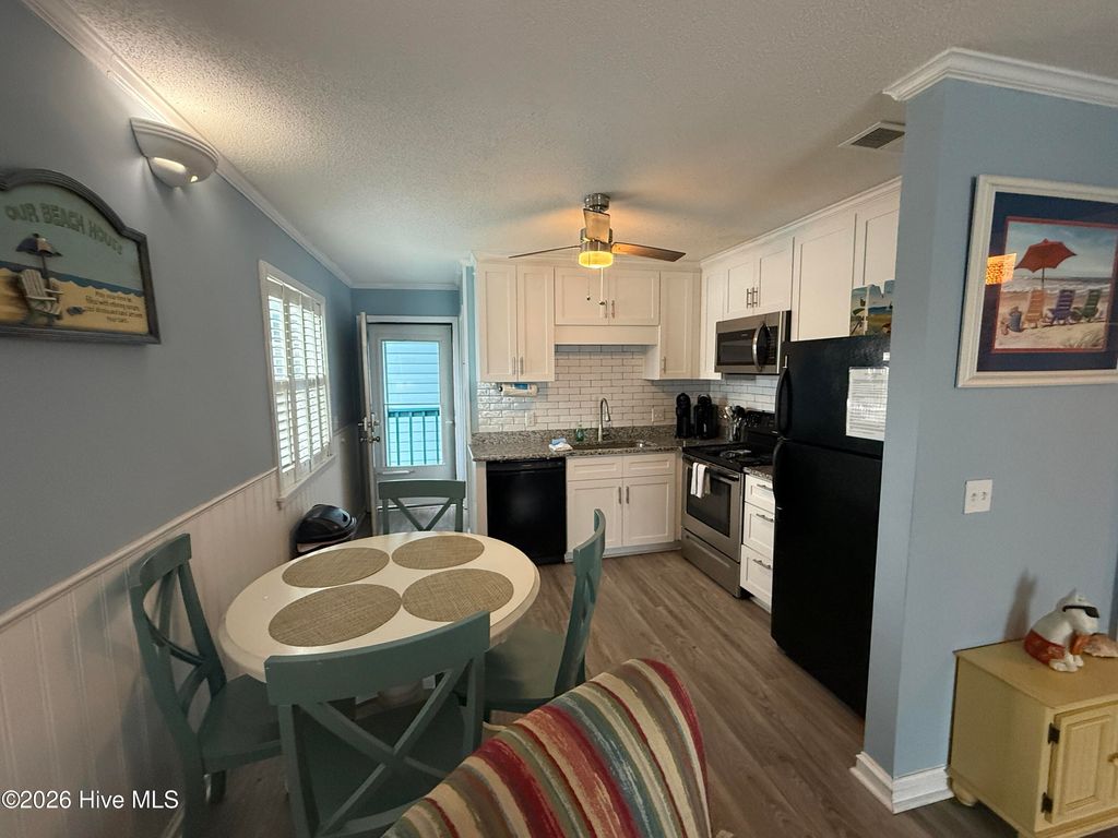 Image 5 of property listing at 1404 Canal Drive Apt 27, Carolina Beach, NC 28428