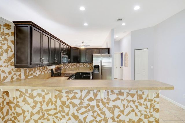 709 NW North Macedo Boulevard, Port St. Lucie, Port St Lucie, FL 34983