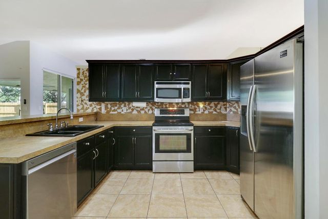 709 NW North Macedo Boulevard, Port St. Lucie, Port St Lucie, FL 34983