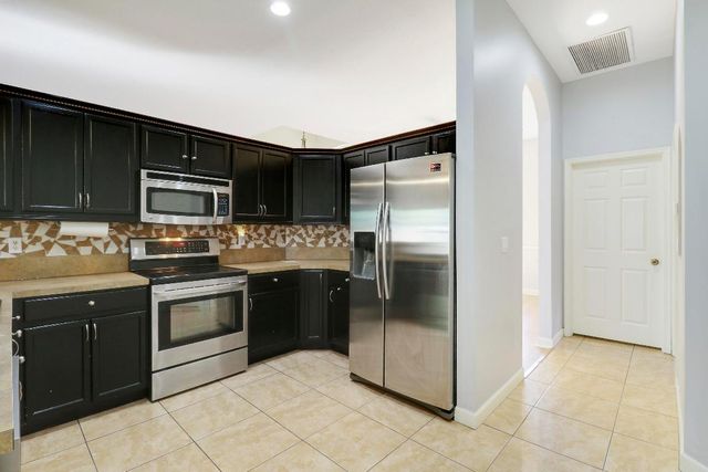 709 NW North Macedo Boulevard, Port St. Lucie, Port St Lucie, FL 34983