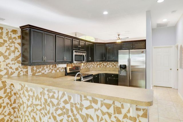 709 NW North Macedo Boulevard, Port St. Lucie, Port St Lucie, FL 34983