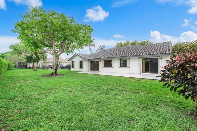 9561 N Orchard Circle, Davie, FL 33328