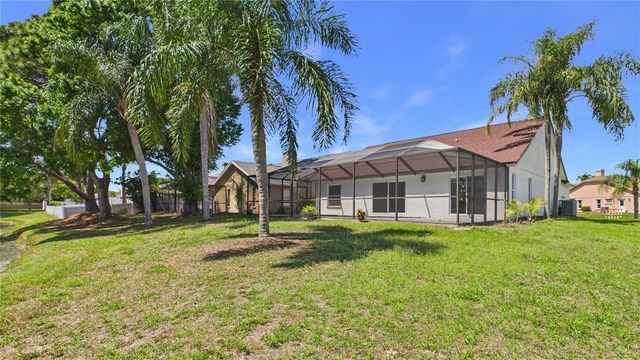 8609 BOYSENBERRY DRIVE, Tampa, FL 33635