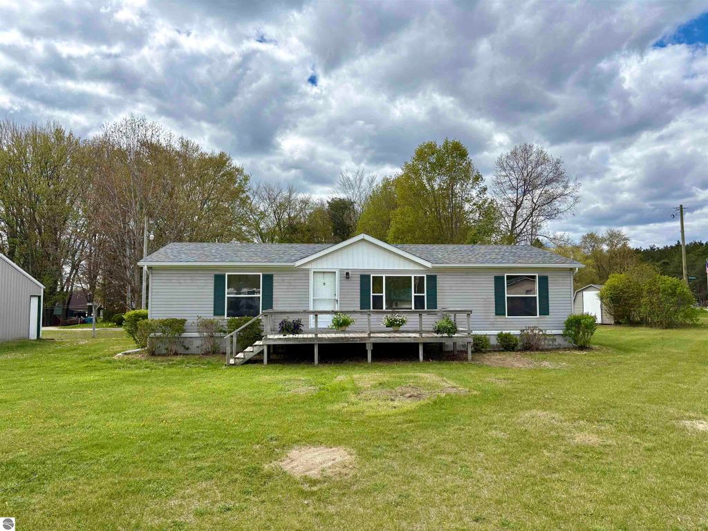 Image 1 of property listing at 1973 Midway Drive, Weidman, MI 48893