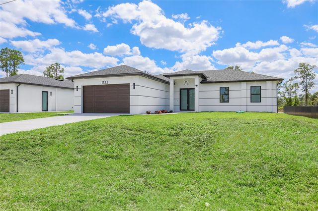 1122 S EDELWEISS STREET E, Lehigh Acres, FL 33974