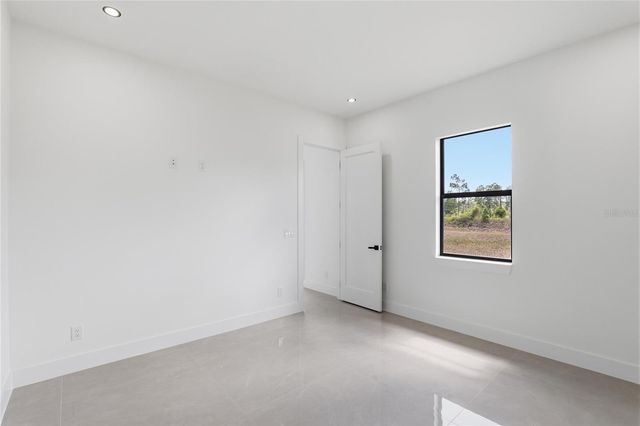 1122 S EDELWEISS STREET E, Lehigh Acres, FL 33974