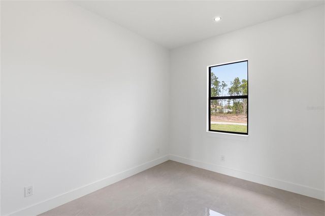 1122 S EDELWEISS STREET E, Lehigh Acres, FL 33974