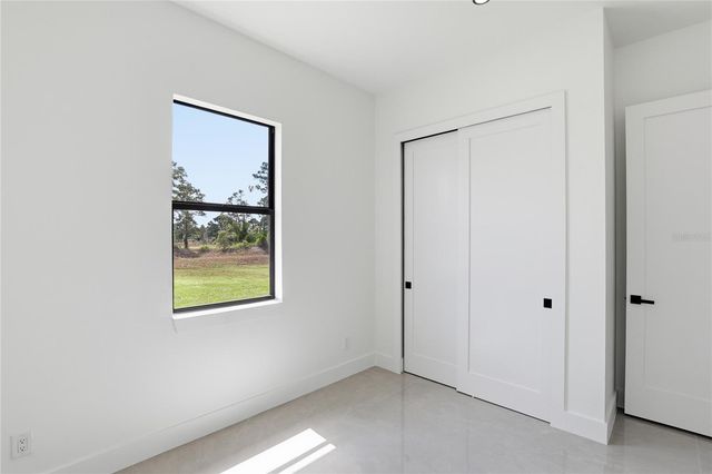 1122 S EDELWEISS STREET E, Lehigh Acres, FL 33974