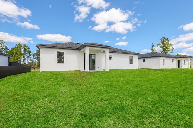 1122 S EDELWEISS STREET E, Lehigh Acres, FL 33974