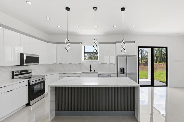 1122 S EDELWEISS STREET E, Lehigh Acres, FL 33974