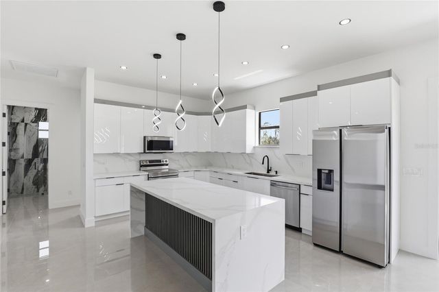 1122 S EDELWEISS STREET E, Lehigh Acres, FL 33974