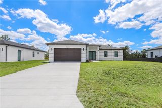 1122 S EDELWEISS STREET E, Lehigh Acres, FL 33974