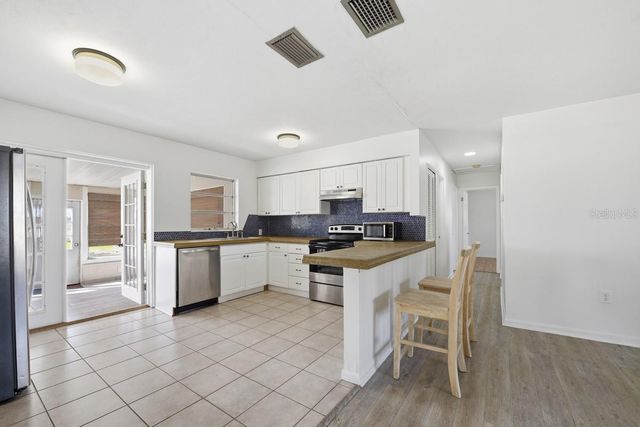 14338 LAKE JUNIETTA DRIVE, Tavares, FL 32778