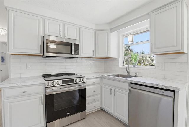 1126 CLAIRBORNE STREET, Holiday, FL 34690