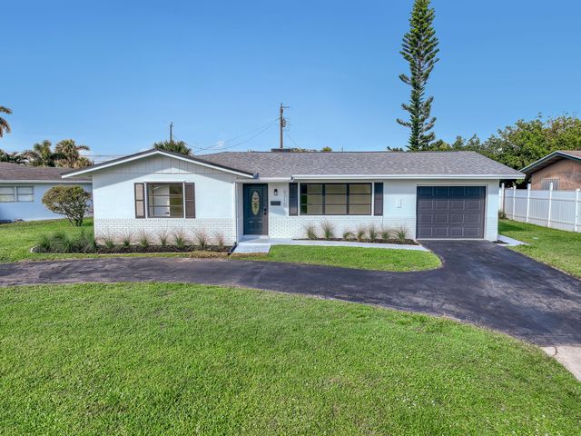 9715 Dahlia Avenue, Palm Beach Gardens, FL 33410