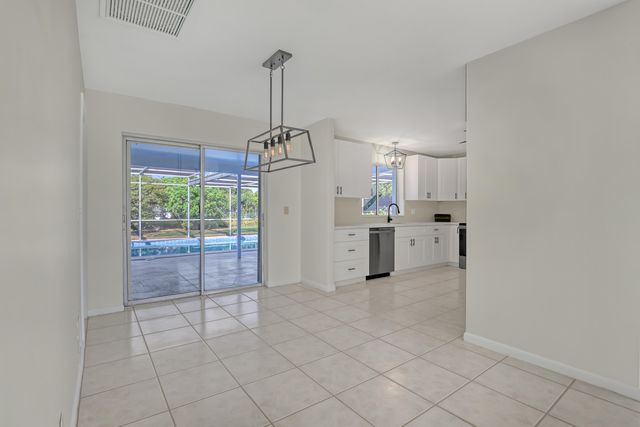 9715 Dahlia Avenue, Palm Beach Gardens, FL 33410