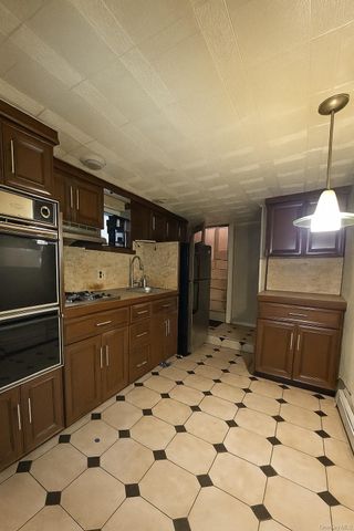 97-32 84th Street, Ozone Park, NY 11416