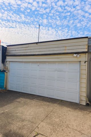 97-32 84th Street, Ozone Park, NY 11416