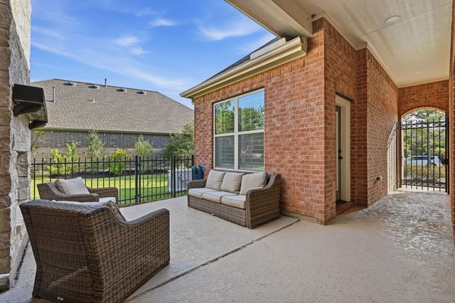 7 Sleeping Colt Place, Spring, TX 77389