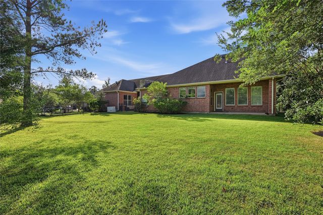 7 Sleeping Colt Place, Spring, TX 77389