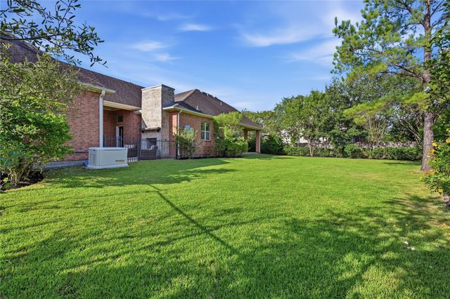 7 Sleeping Colt Place, Spring, TX 77389