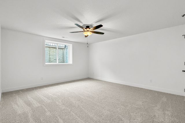 606 KEVIN Road, Blue Grass, IA 52726