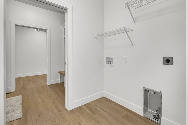 606 KEVIN Road, Blue Grass, IA 52726