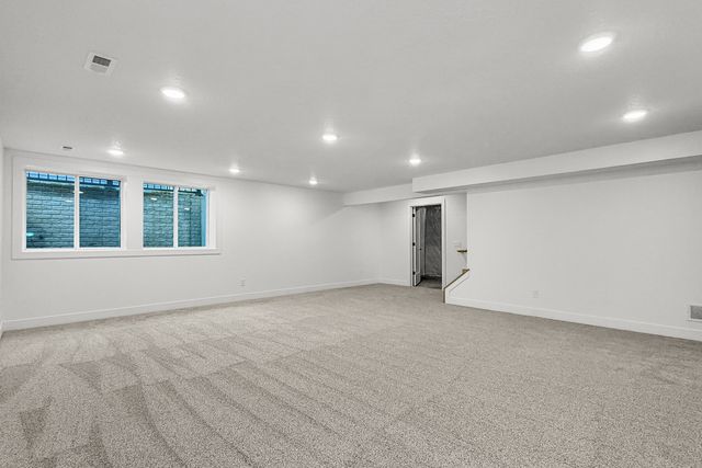 606 KEVIN Road, Blue Grass, IA 52726