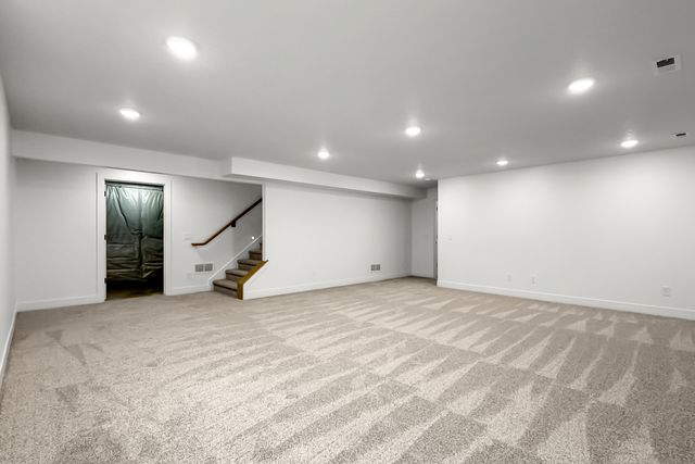 606 KEVIN Road, Blue Grass, IA 52726