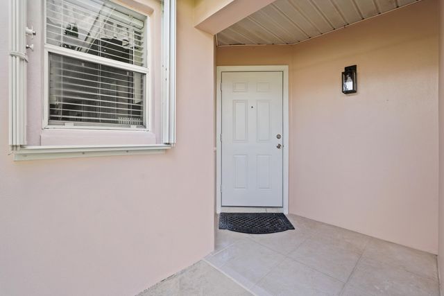 1209 PINE SAGE Circle, West Palm Beach, FL 33409