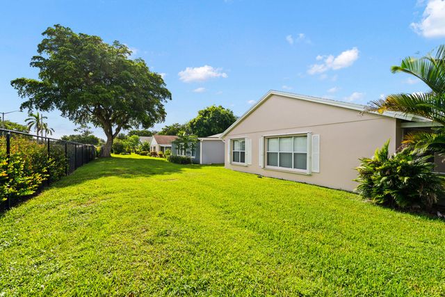 1209 PINE SAGE Circle, West Palm Beach, FL 33409