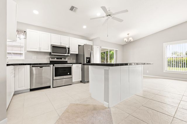 1209 PINE SAGE Circle, West Palm Beach, FL 33409