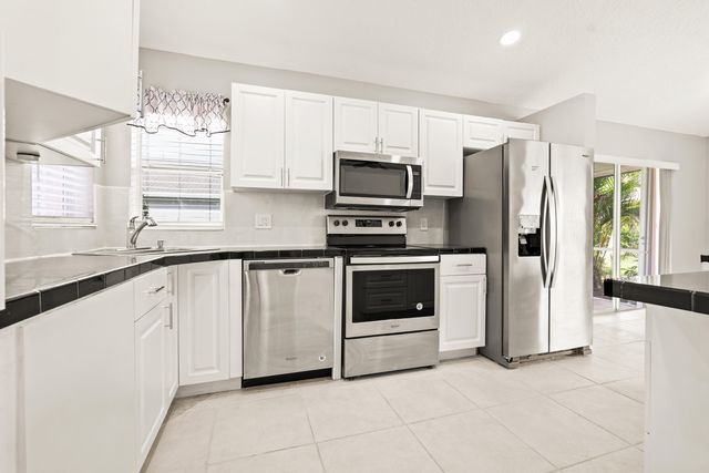 1209 PINE SAGE Circle, West Palm Beach, FL 33409