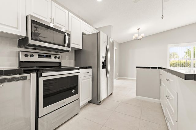 1209 PINE SAGE Circle, West Palm Beach, FL 33409